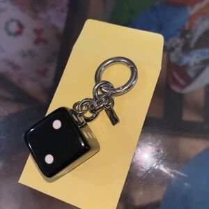 Black Coach Dice Charm from Loved Denim
